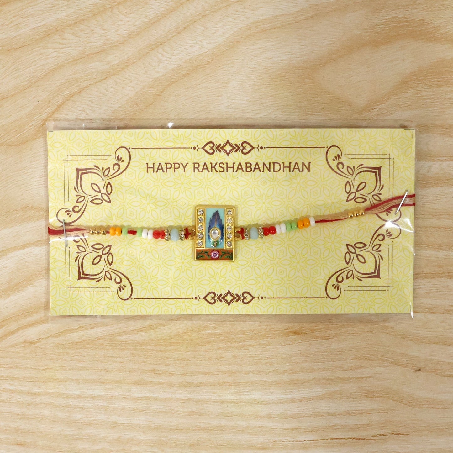 Mor Pankh Square Kundan Charm Rakhi styled for Raksha Bandhan celebration