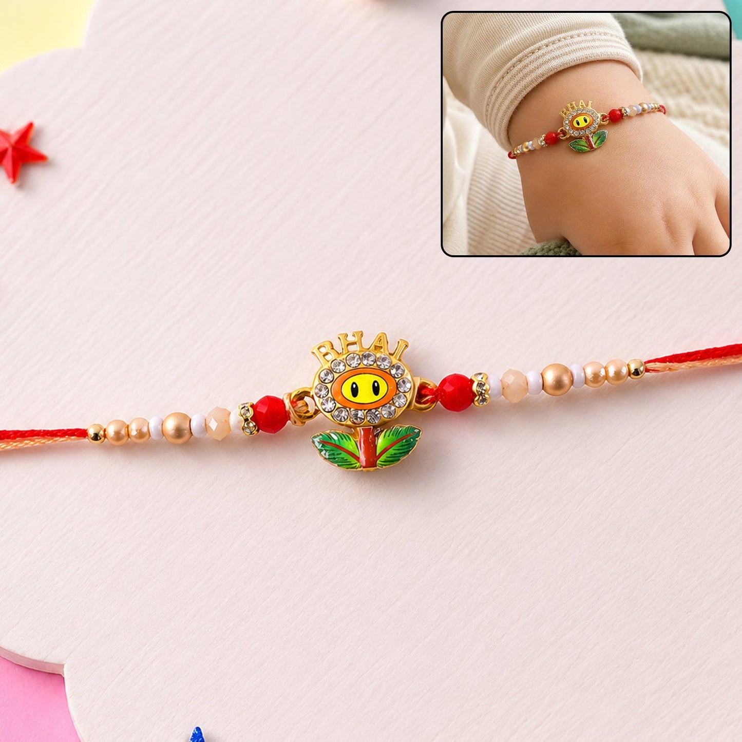 Beautiful Smiley Flower Charm Beads Rakhi laid flat, ideal for Raksha Bandhan