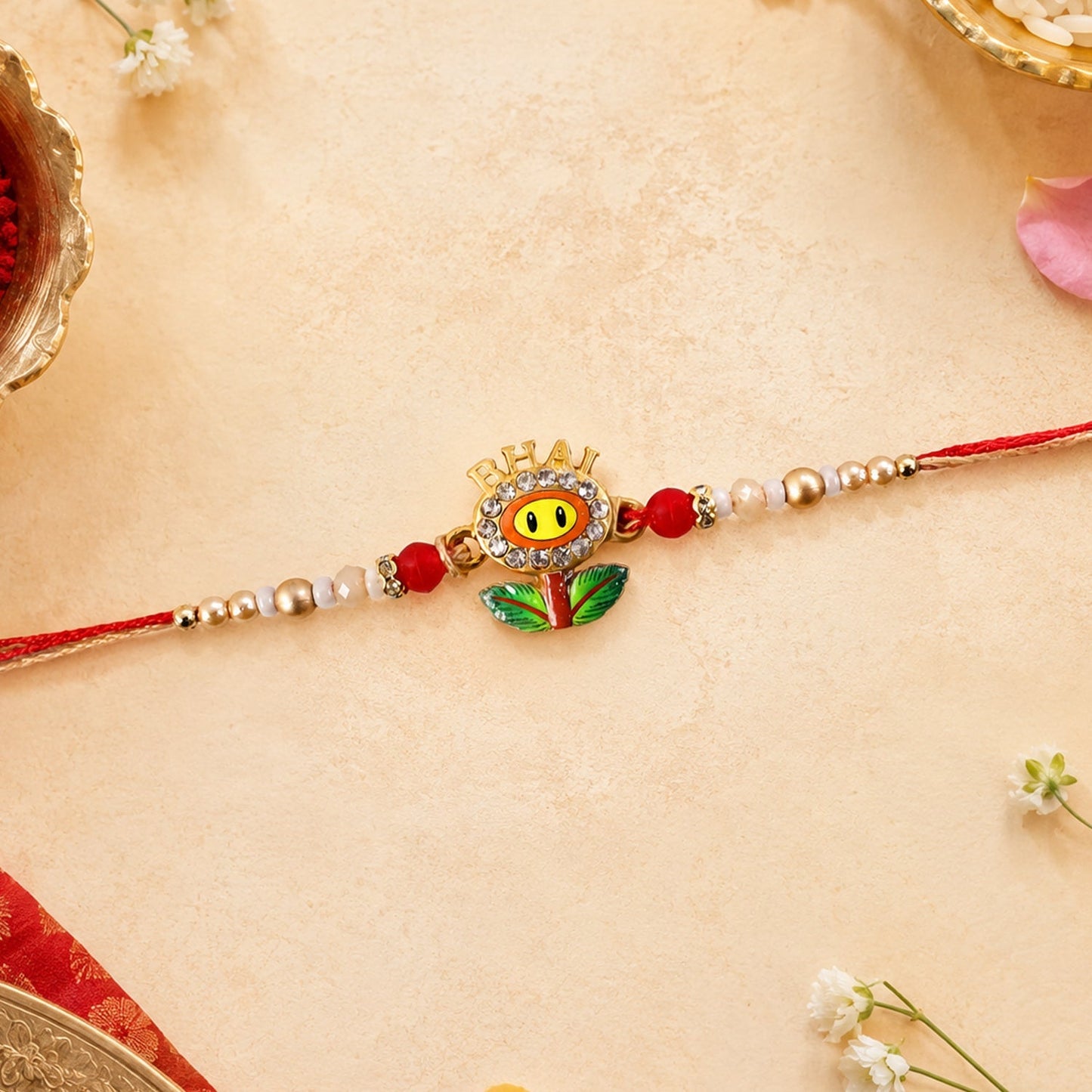 Close-up of Smiley Flower Charm on Rakhi with beads, stylish design