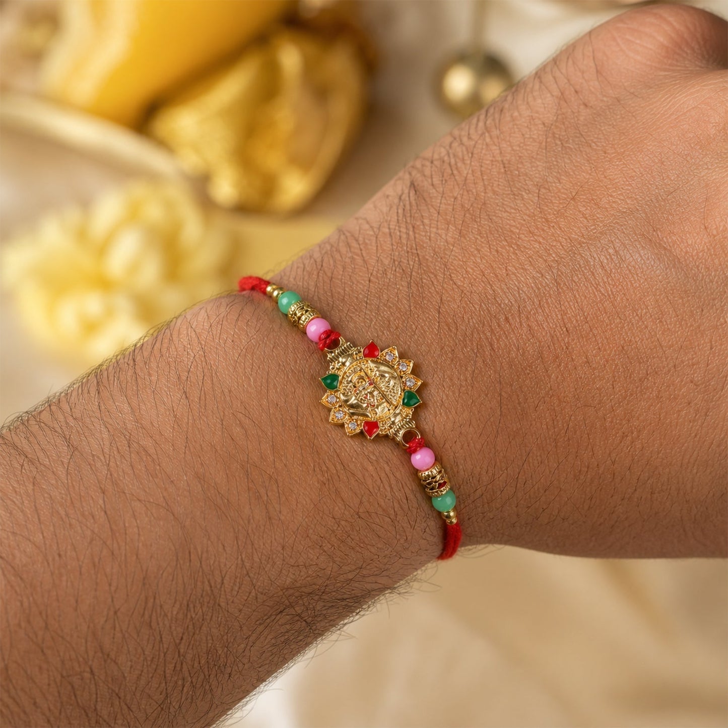 Side view of Veera Charm Beaded Rakhi showing bead details