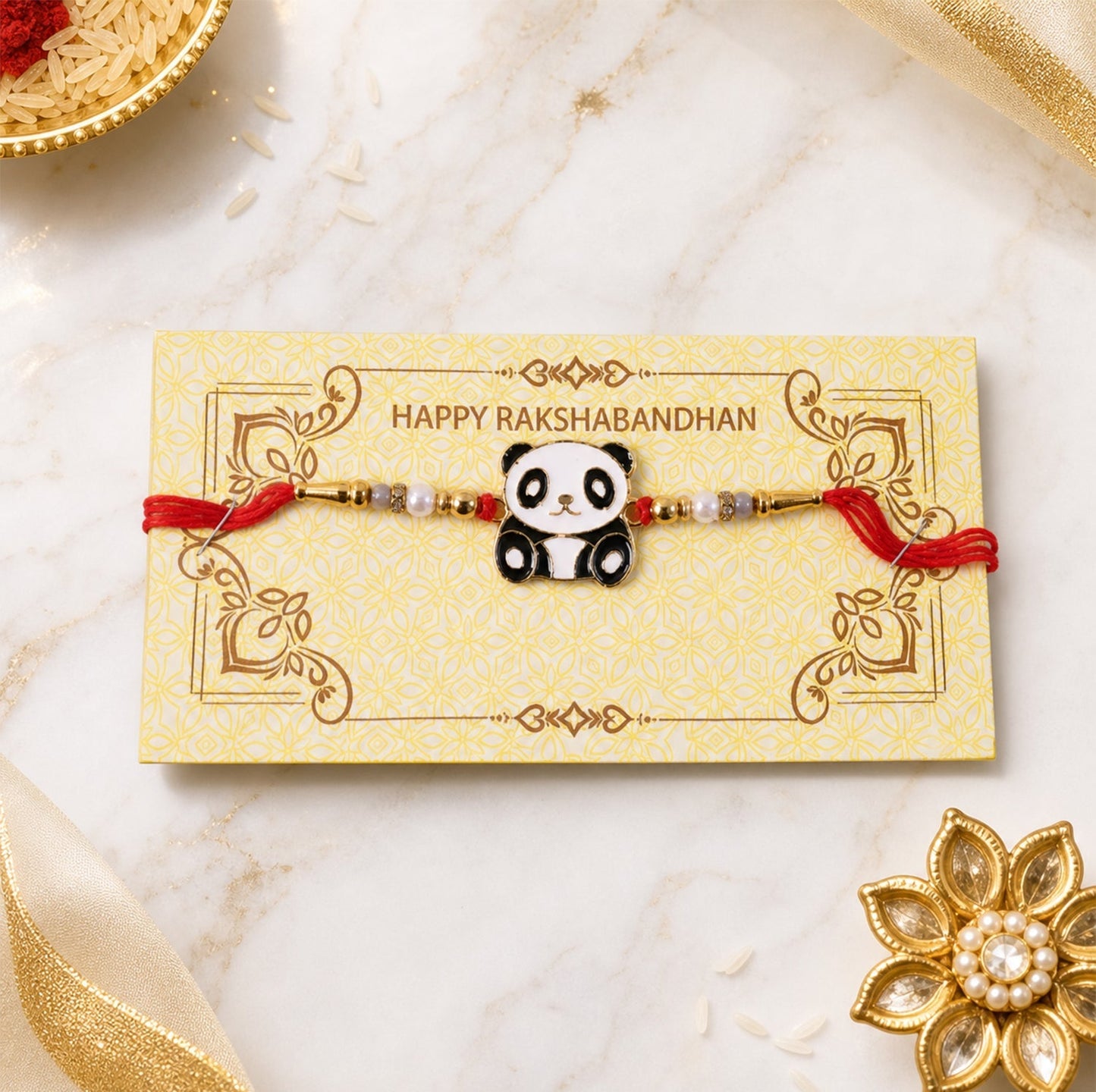 Top view of designer panda rakhi, stylish children’s gift