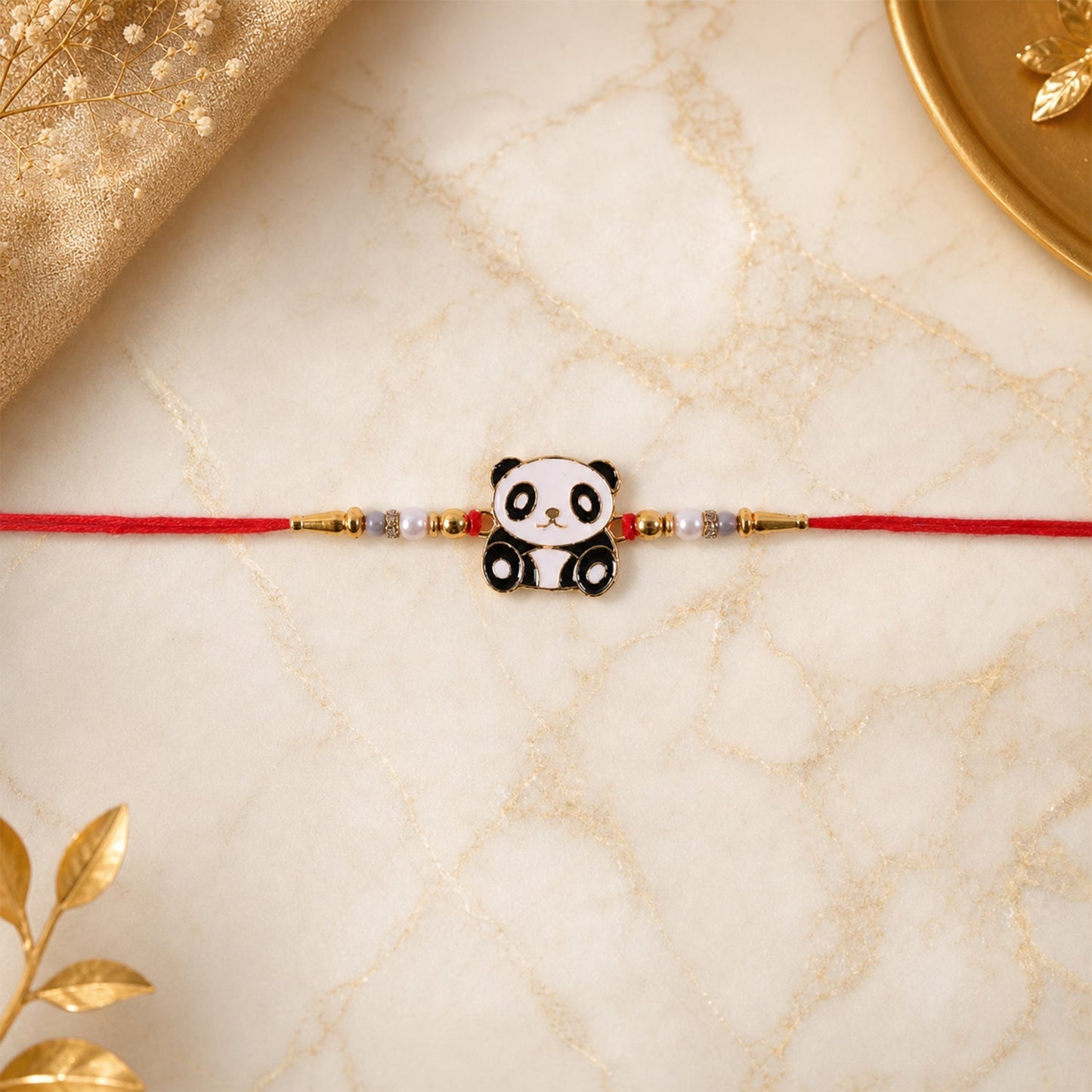Stylish kids rakhi with panda charm and pearl beads
