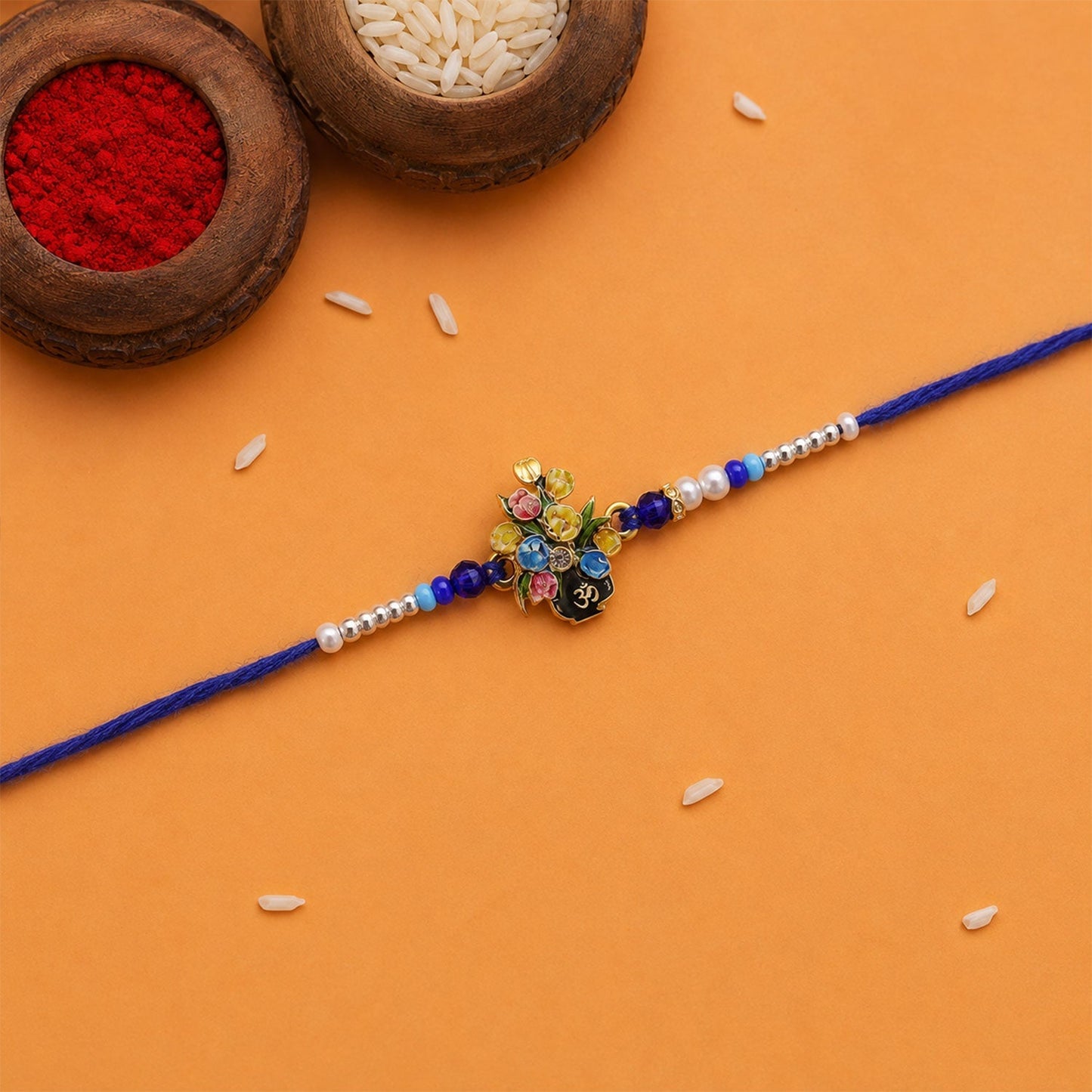 Full view of Om flower bouquet Rakhi with beads