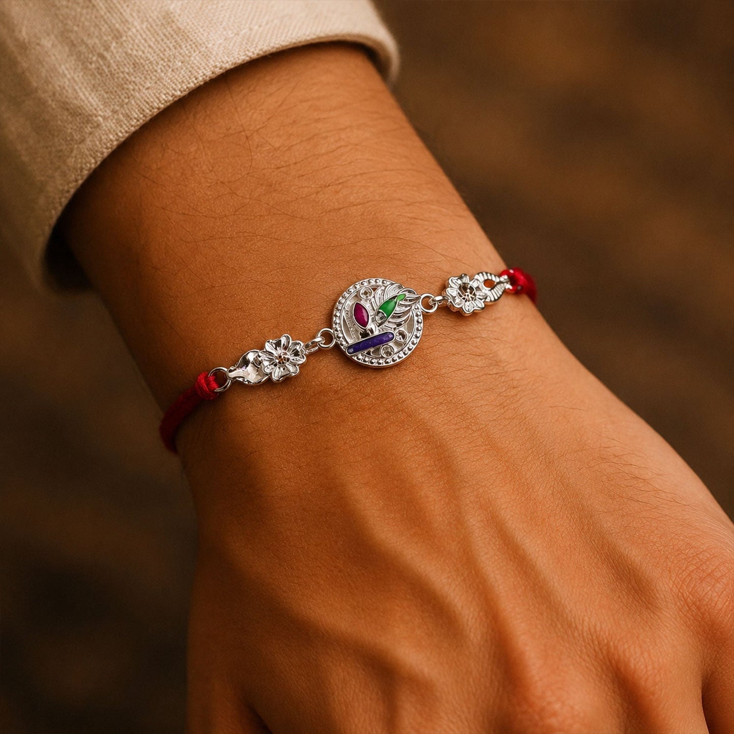 Side view of silver rakhi with stylish design