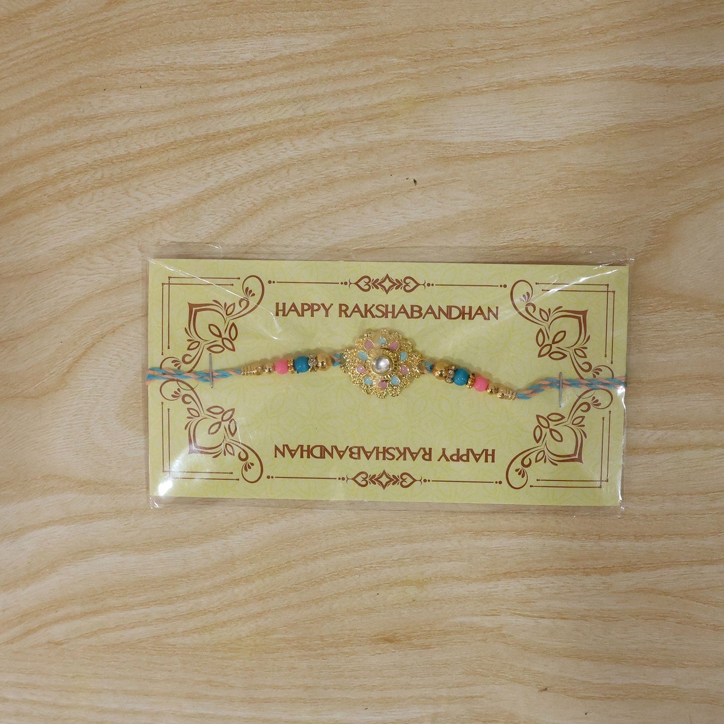 Zoomed view of designer rakhi charms and beads