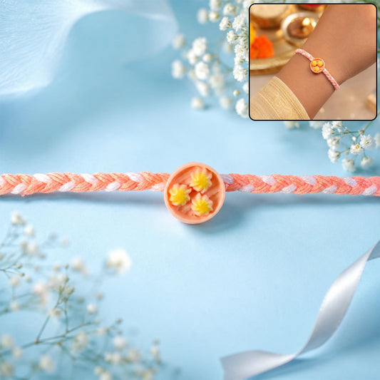 Close-up of elegant Rakhi for brother with a round charm