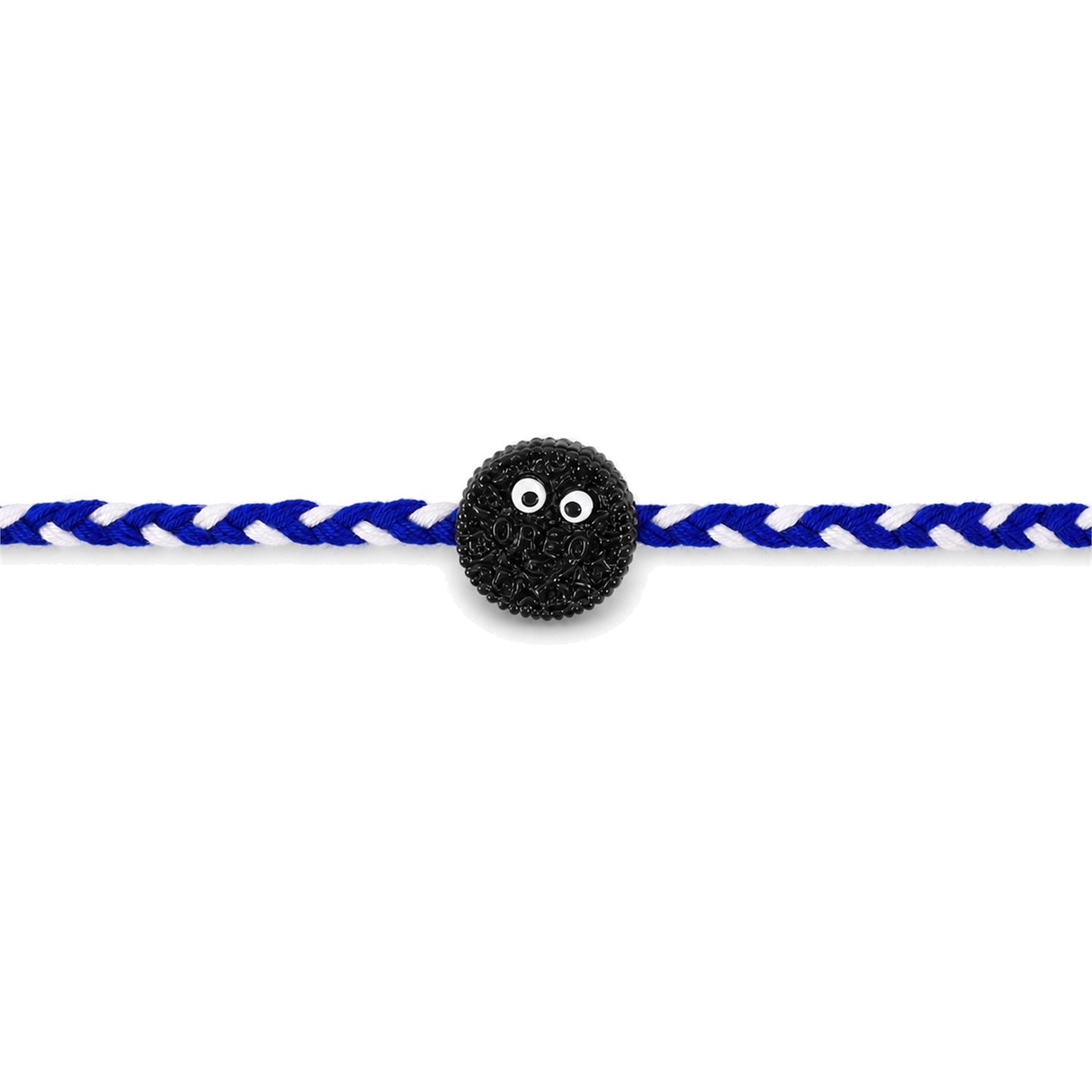 Close-up of festive braided Rakhi with cookie eyes charm