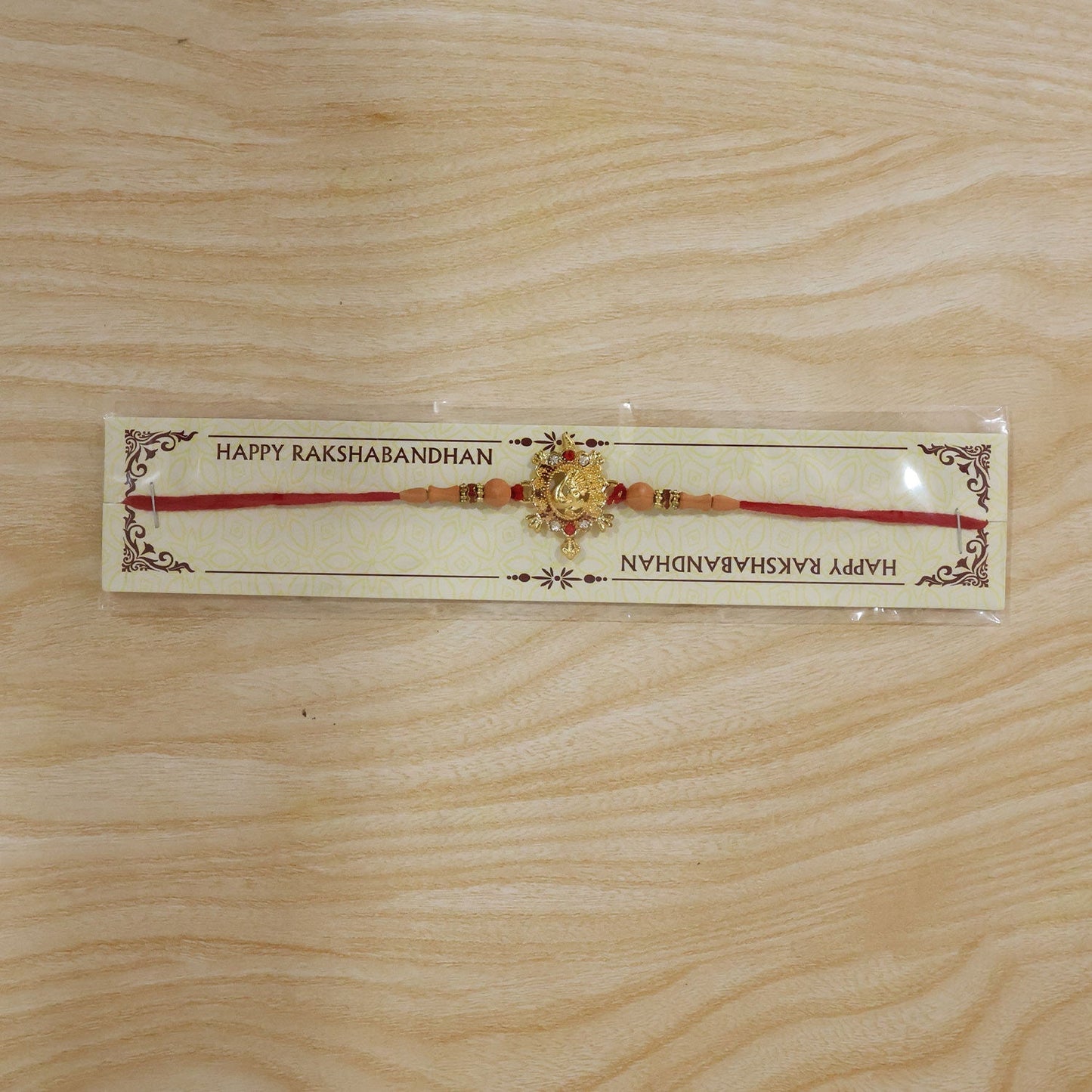Turtle Peacock Rakhi tied on a brother's wrist for Raksha Bandhan