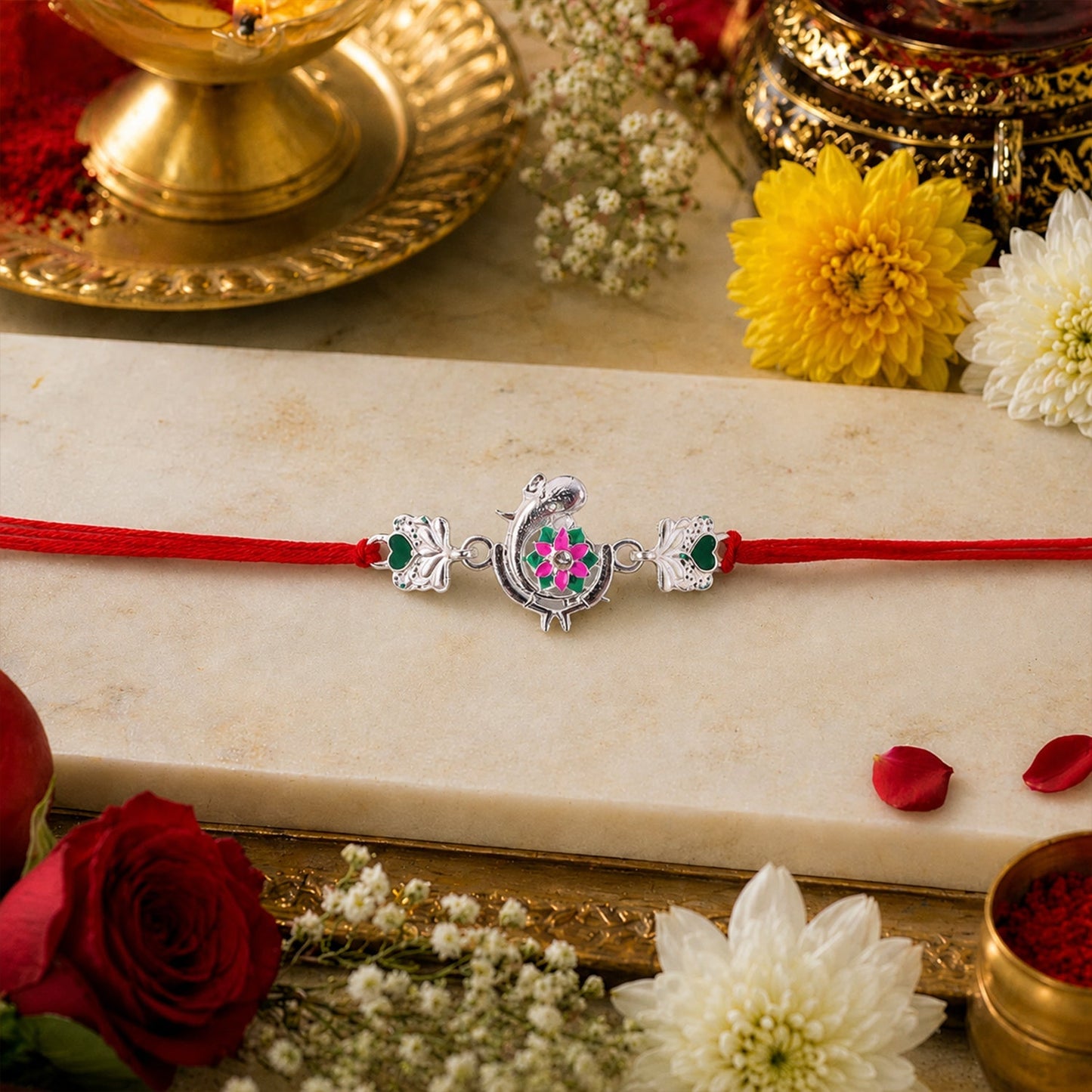 Top view of Silver Peacock Flower Heart Rakhi highlighting elegance