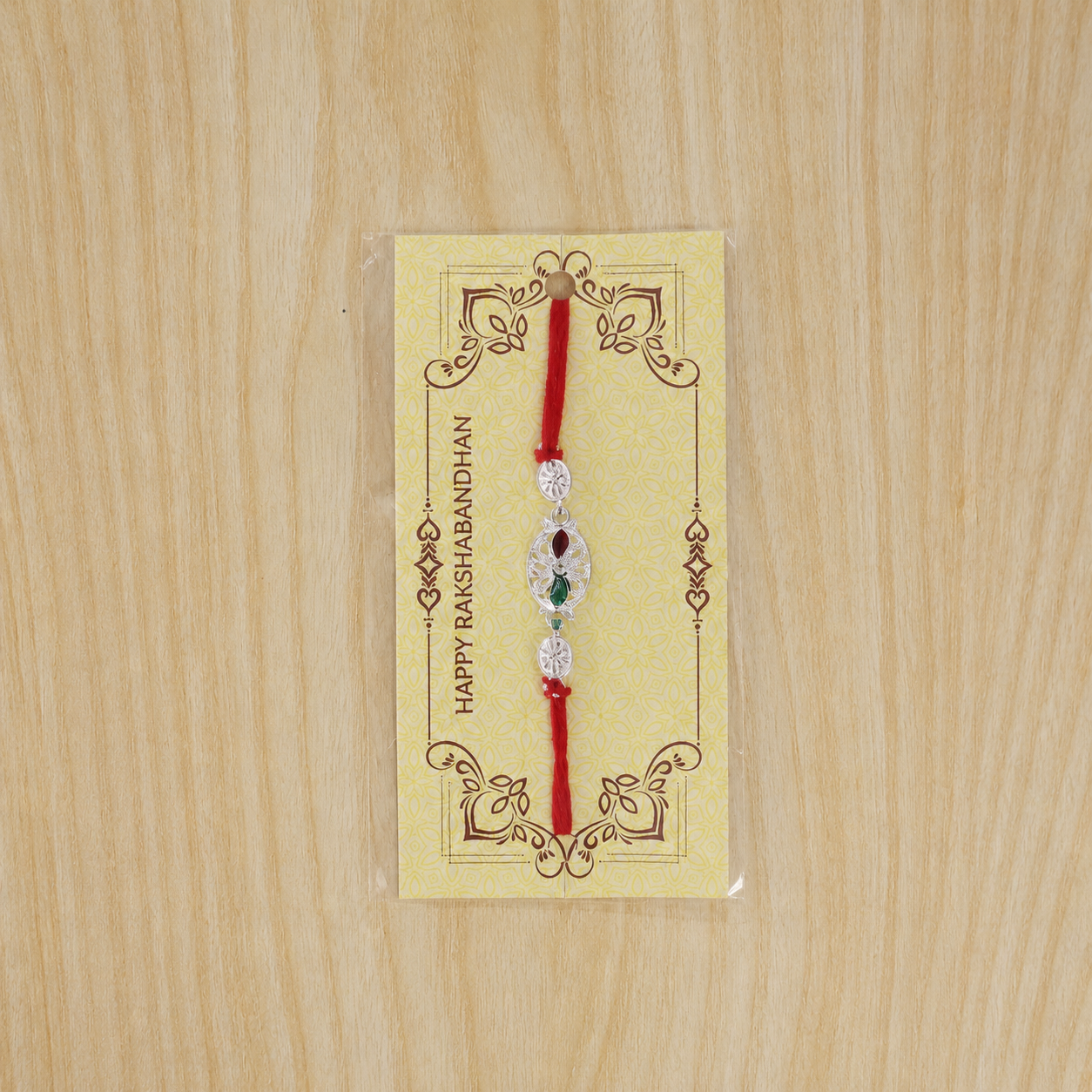 Rakhi tied on wrist demonstrating wearable style