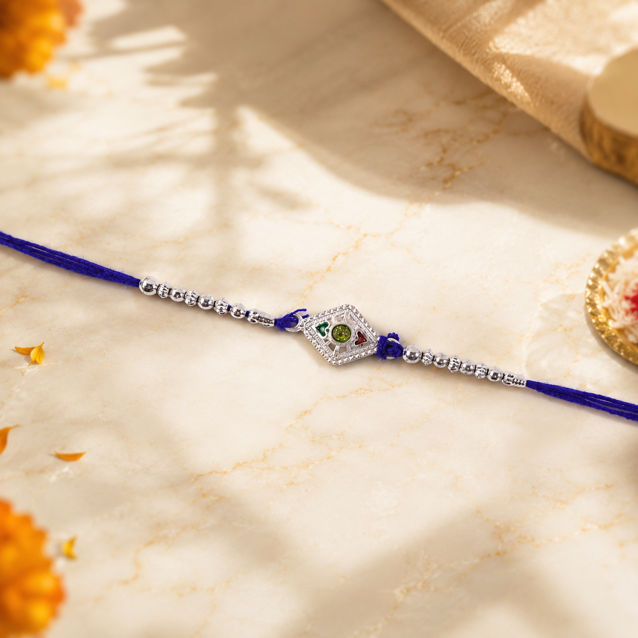 Side view of the designer Silver Kite Rakhi, highlighting its craftsmanship.