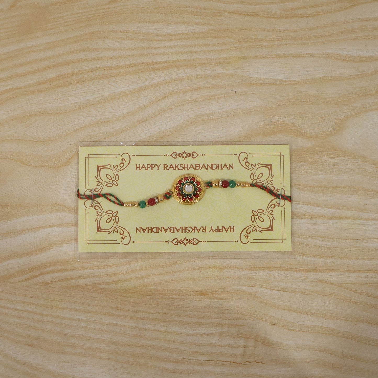 Festive rakhi with bright meenakari and kundan accents, perfect for Raksha Bandhan celebrations