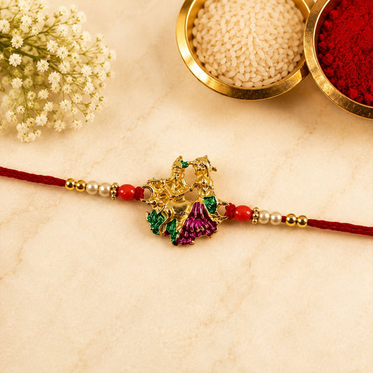 Colorful Meenakari Radhe Krishna Rakhi with decorative beads on vibrant thread