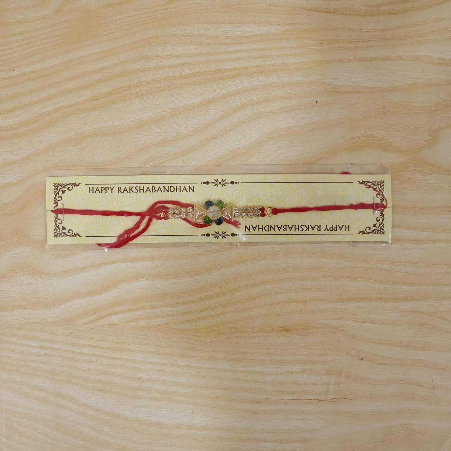 Full view of festive American Diamond Rakhi suitable for all brothers