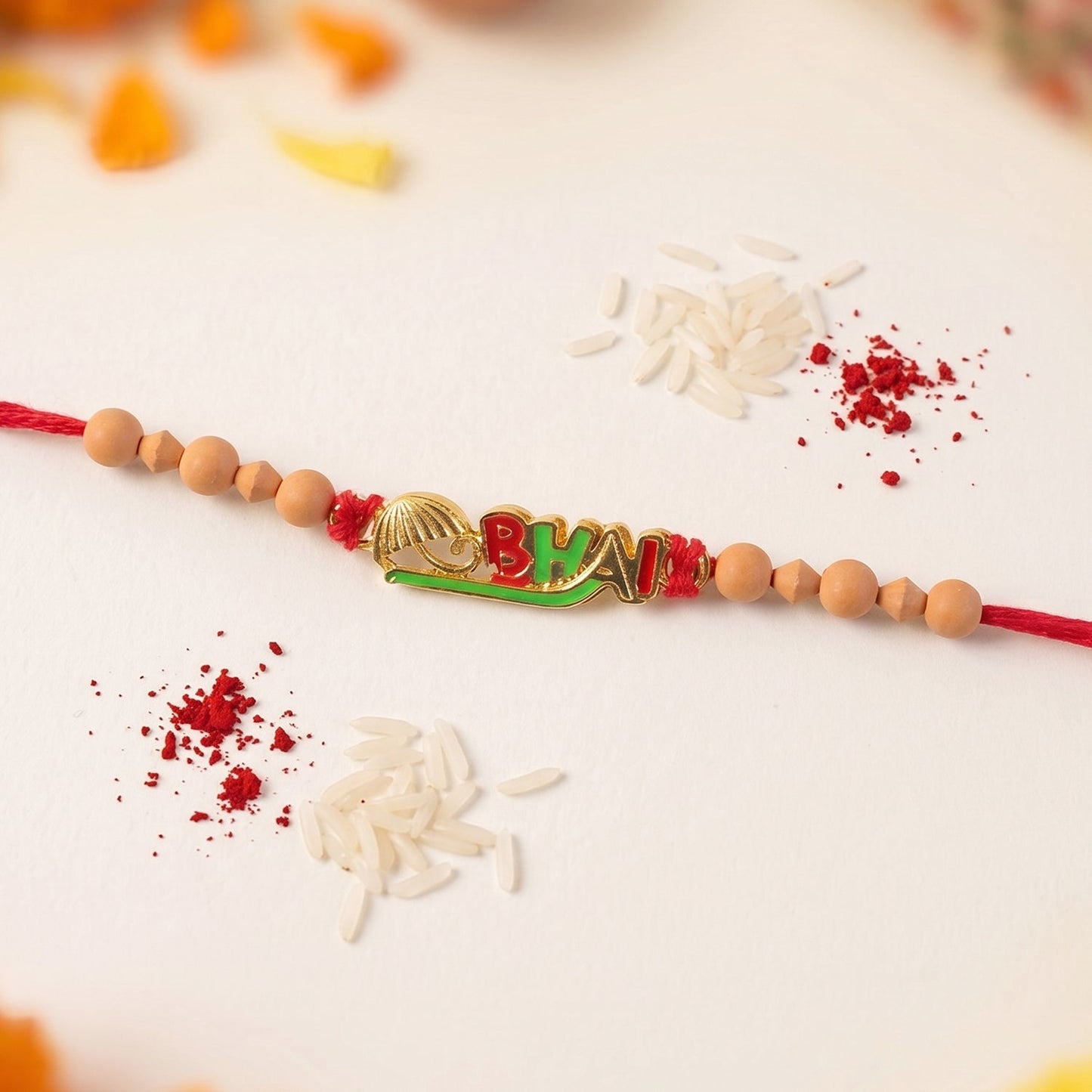 Decorative Rakhi with beads and detailed finishing, ideal for brothers