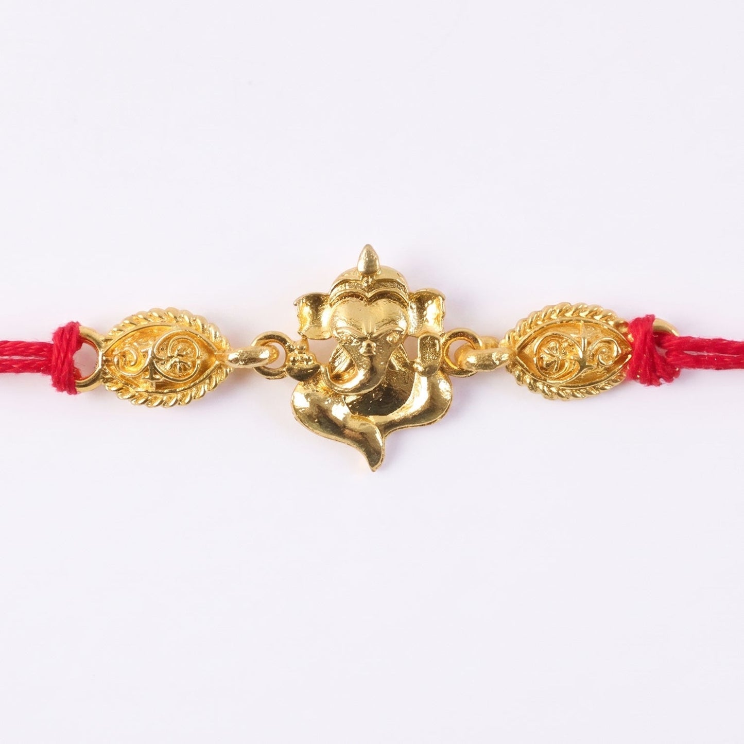 Elegant Twin Lord Ganesha Rakhi with unique divine motif