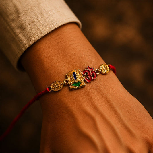 Golden Om Blue Stone Leaf Rakhi featuring decorative beads and stylish design.