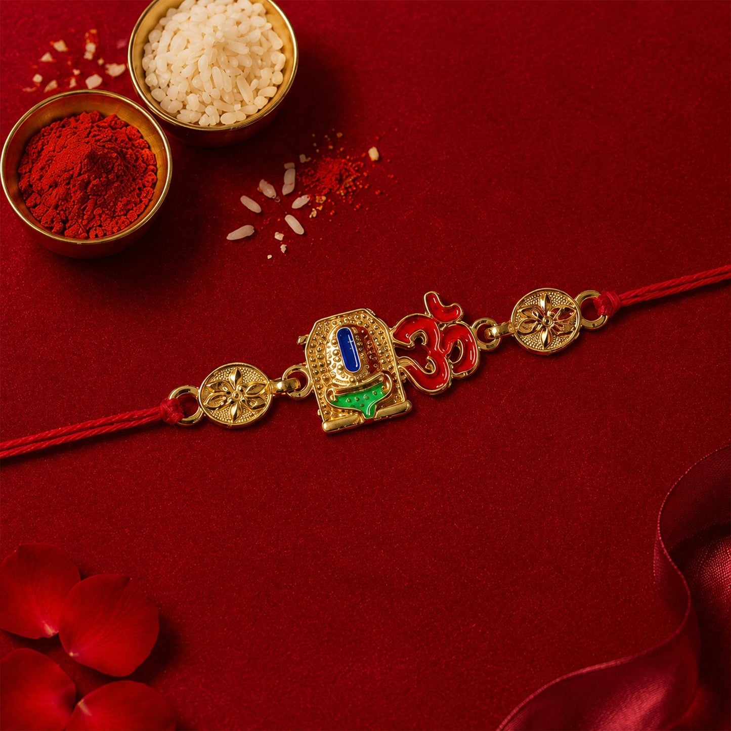 Elegant Rakhi with Om and blue stones for Raksha Bandhan celebration.