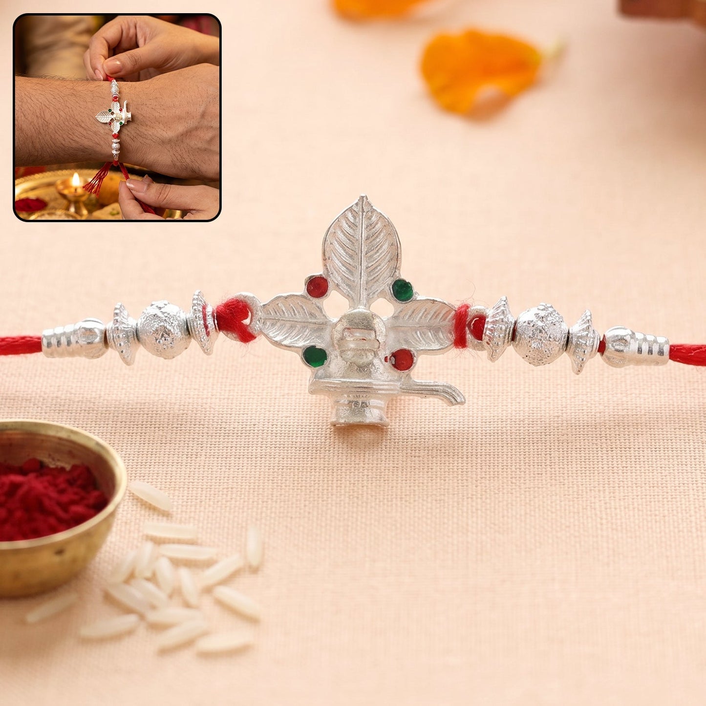 Close-up of traditional Shiv Rakhi with Bilva leaf design and beads