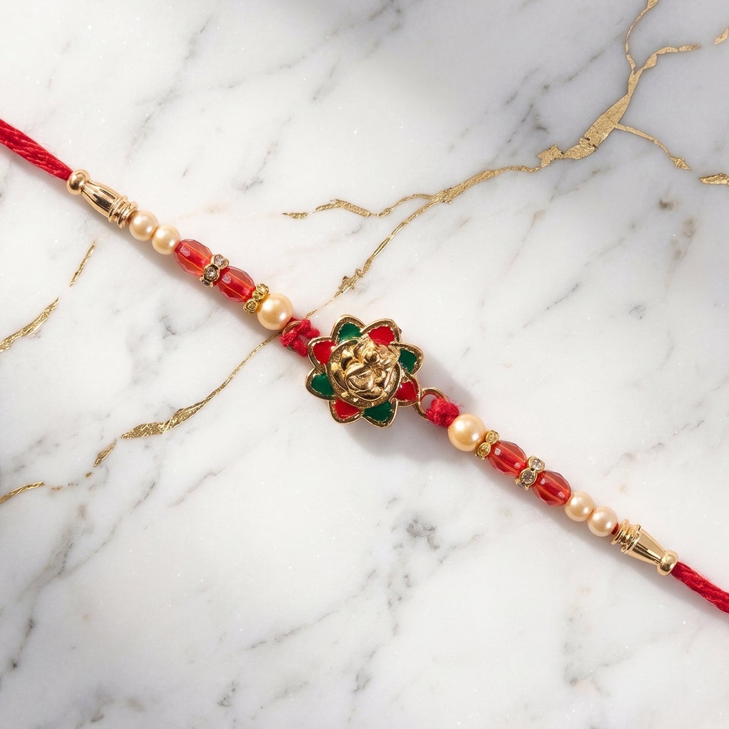 Stylish meenakari rakhi with pearl accents for Raksha Bandhan