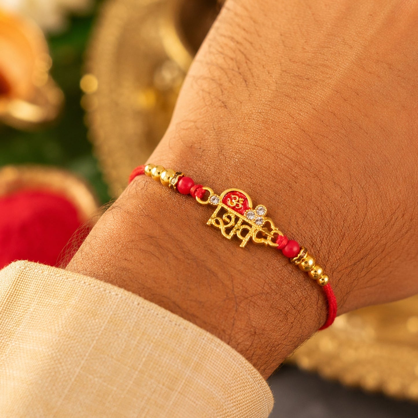 Stylish golden rakhi with intricate detailing for brothers of all ages