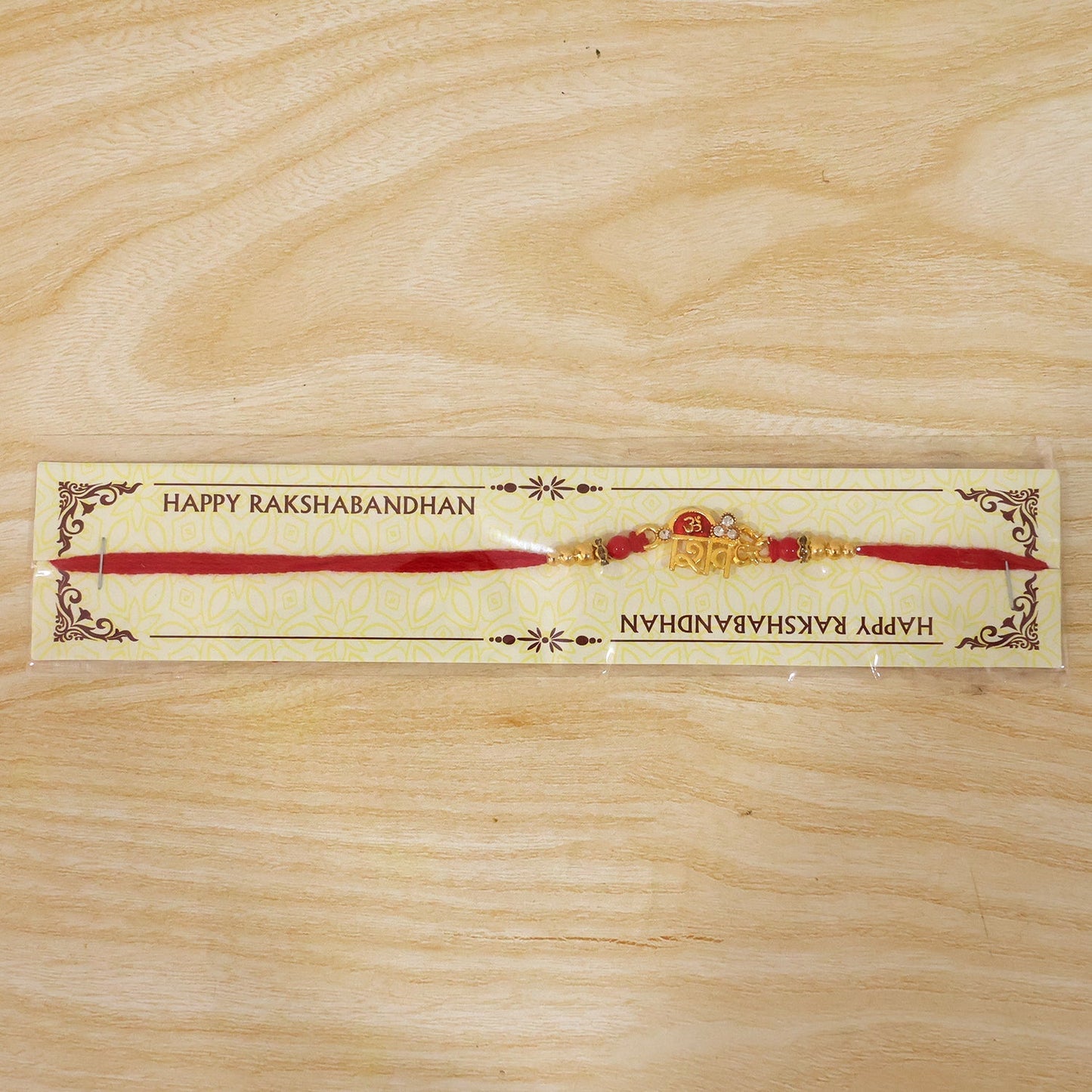 Premium golden Rakhi with attractive detailing, ideal for Raksha Bandhan gifting