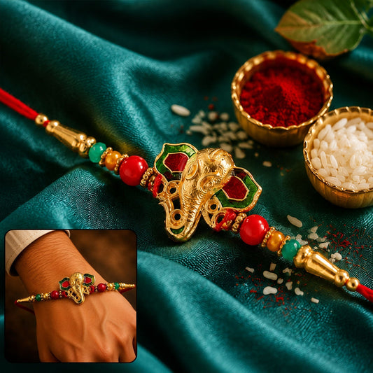 Lord Ganesha golden meenakari Rakhi with red and green beads for brother