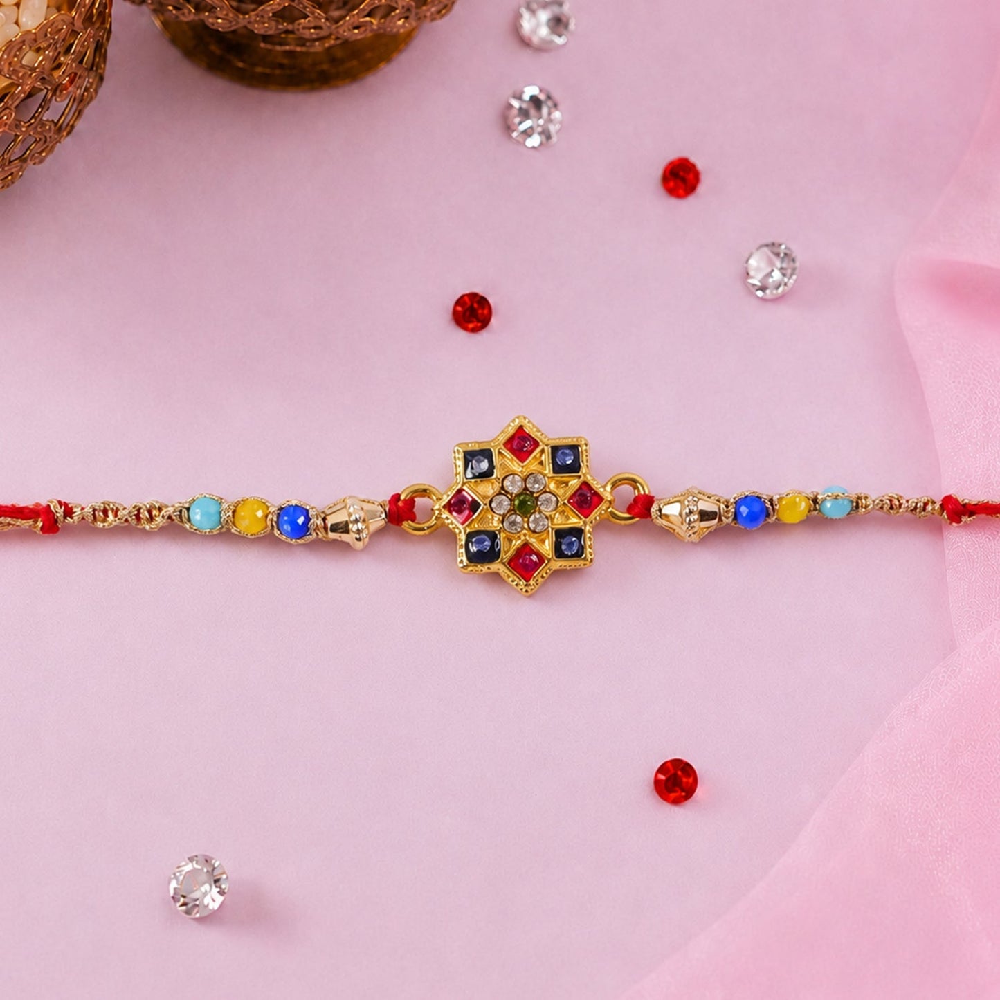 Stylish colorful bead Rakhi on white background, perfect for brothers
