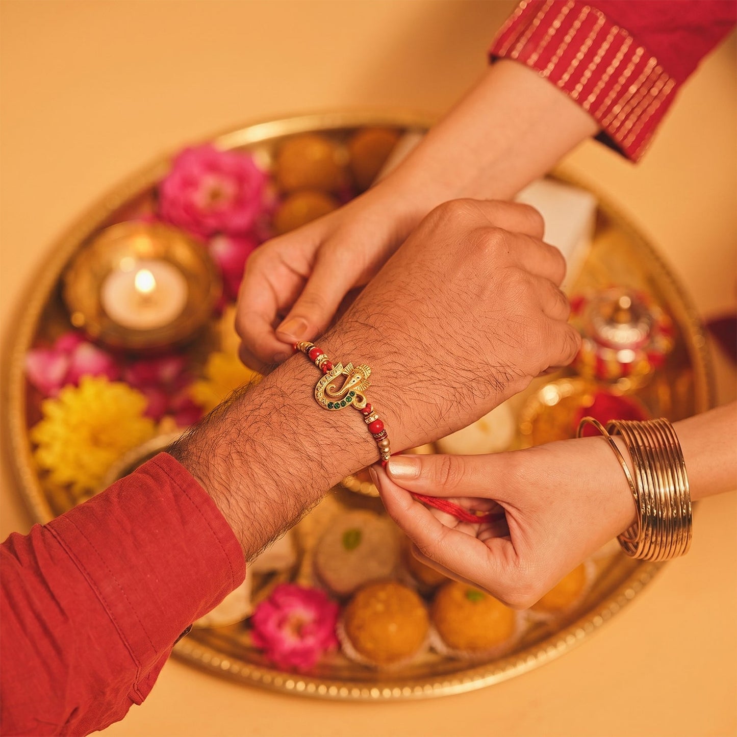 Beautiful festive Rakhi with traditional design, ideal for Raksha Bandhan celebration