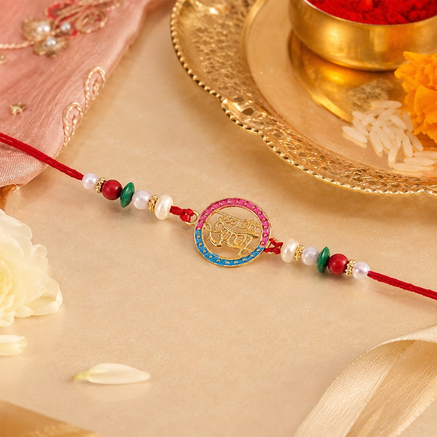 Decorative Rakhi with pearls on a festive background
