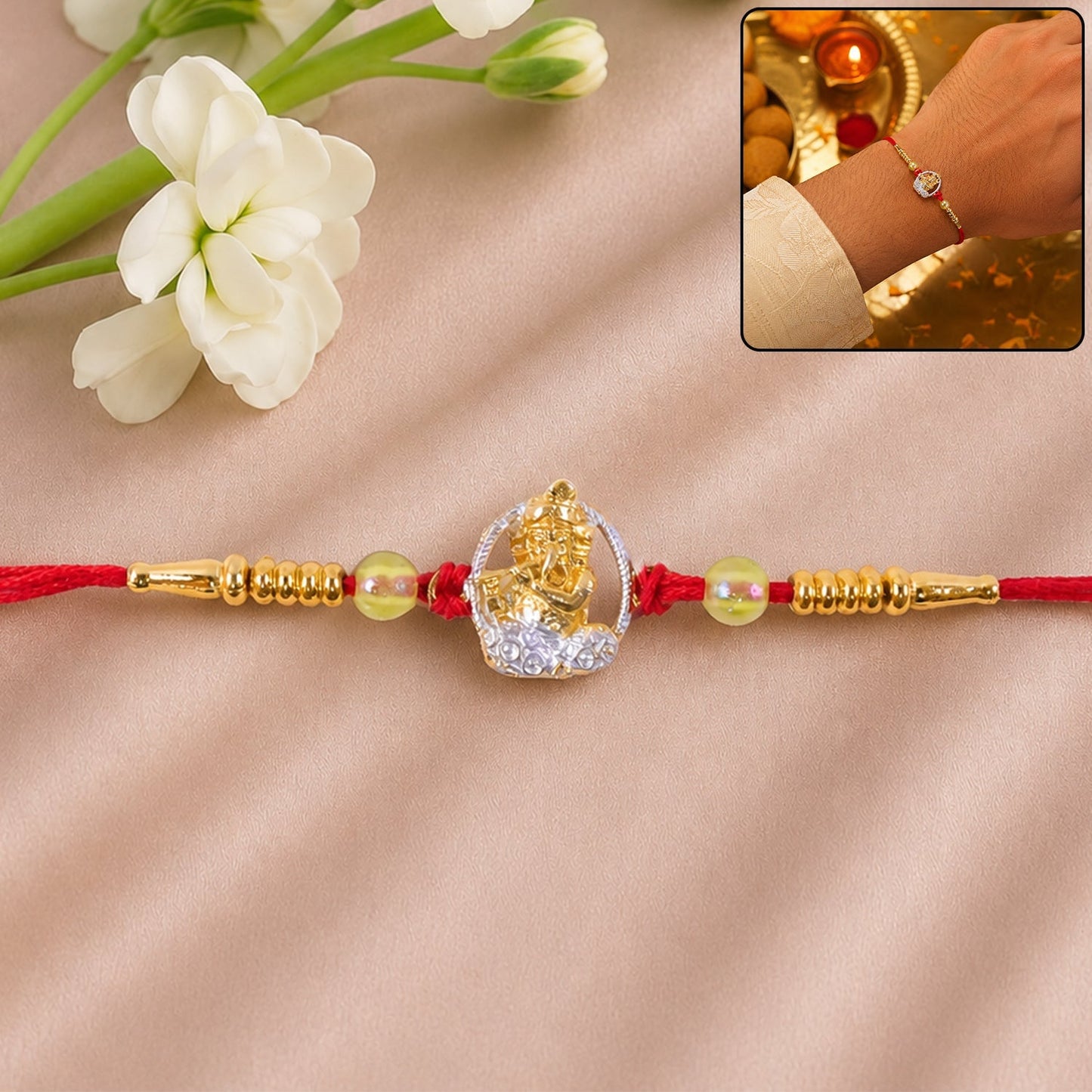 Bal Krishna Rakhi with golden AD stones, front view on white background.