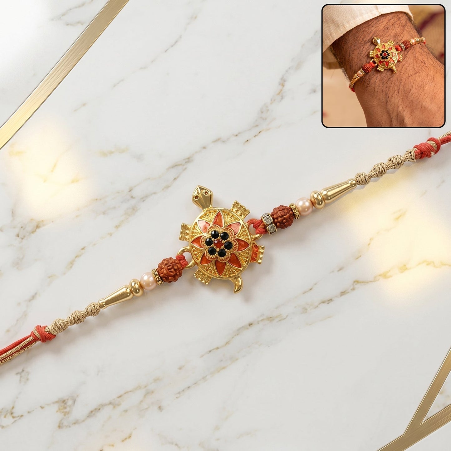 Close-up of the Golden Tortoise Rakhi with an OM symbol and detailed stonework.