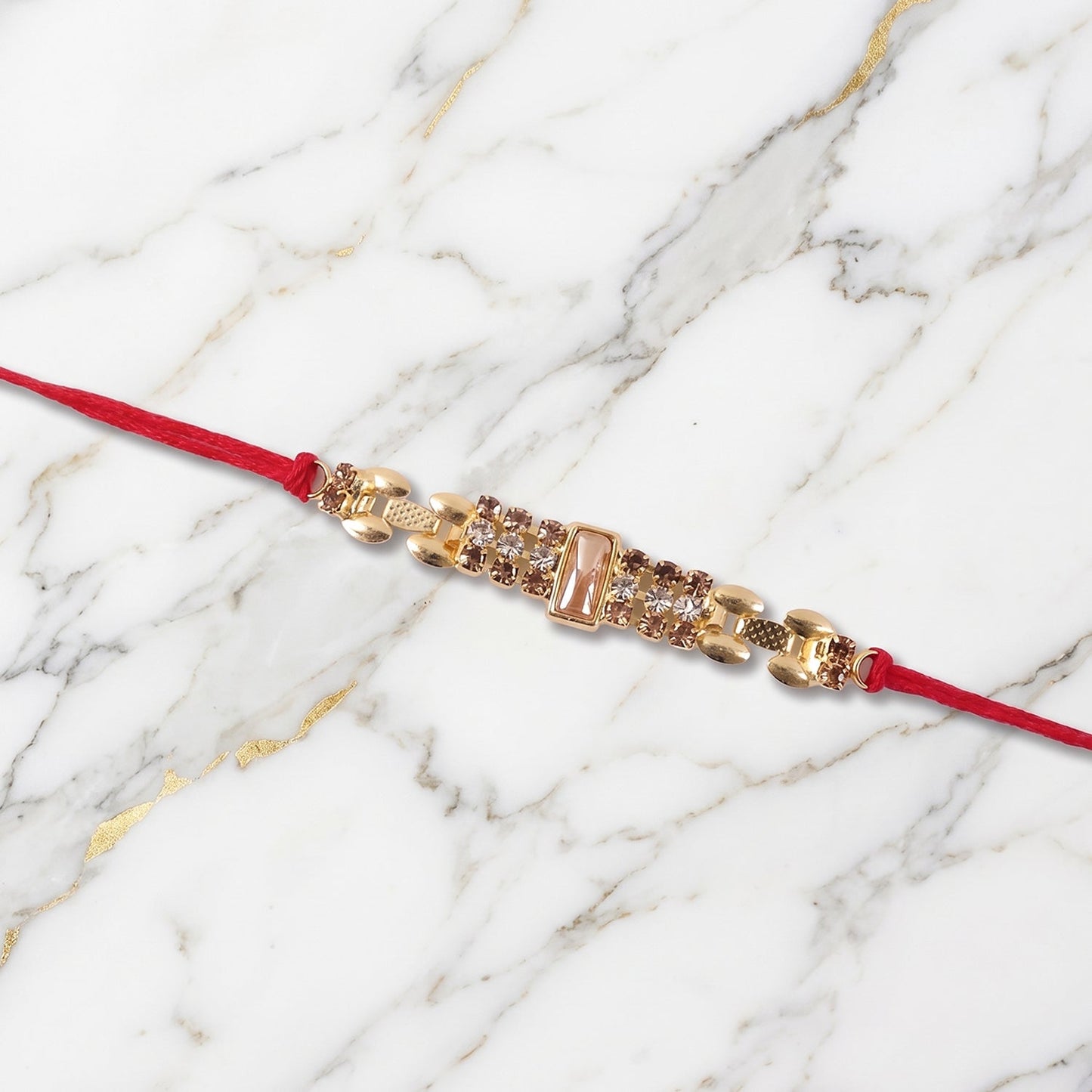 Elegant AD Stone Rakhi displayed against a festive background.