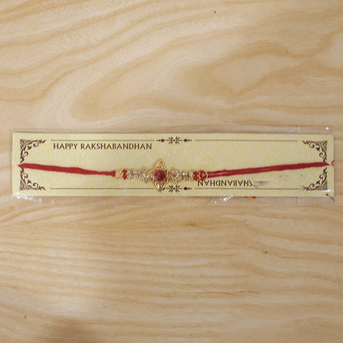 Collection of festive Rakhis including the sparkling gold Marquise design.