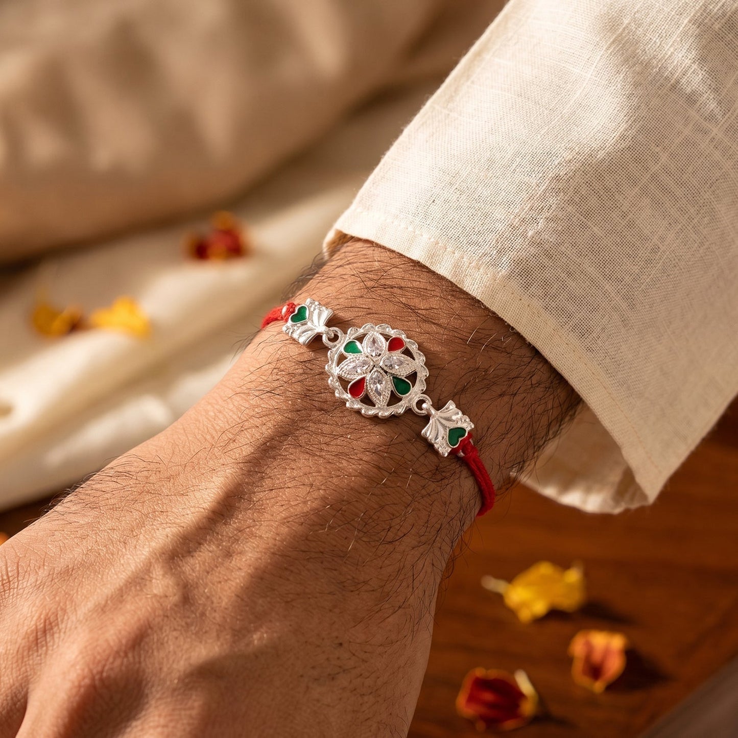 Close-up of the vibrant Meenakari floral work on the Oxidised Rakhi.