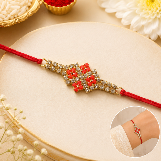 Sparkling designer rakhi for brother with red AD stones.
