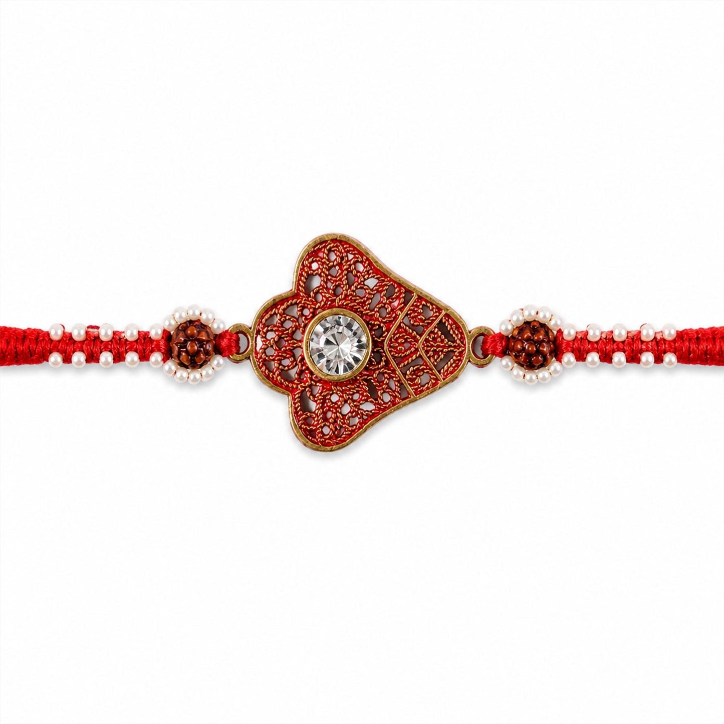 Detailed shot of AD stone and pearl embellishments on Rakhi.
