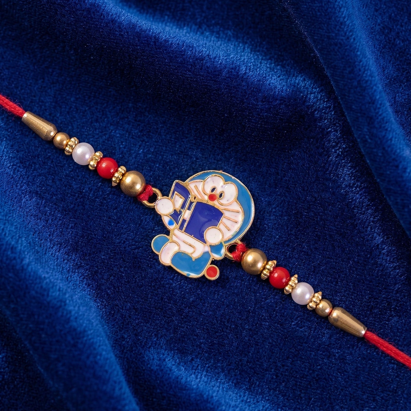Top view displaying the complete Doraemon Kids Rakhi with vibrant colours.