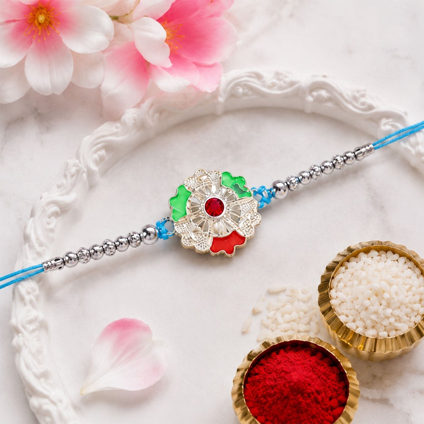 Stylish silver meenakari floral Rakhi ideal for brother and sister
