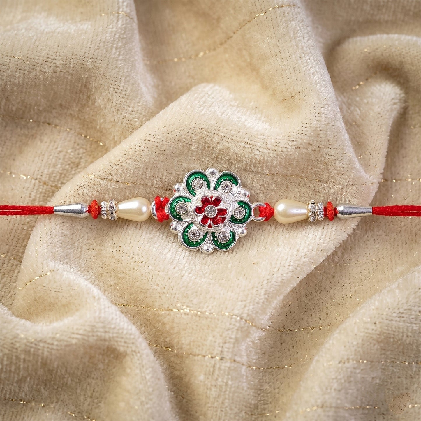 Premium quality meenakari floral rakhi with pearls for Raksha Bandhan