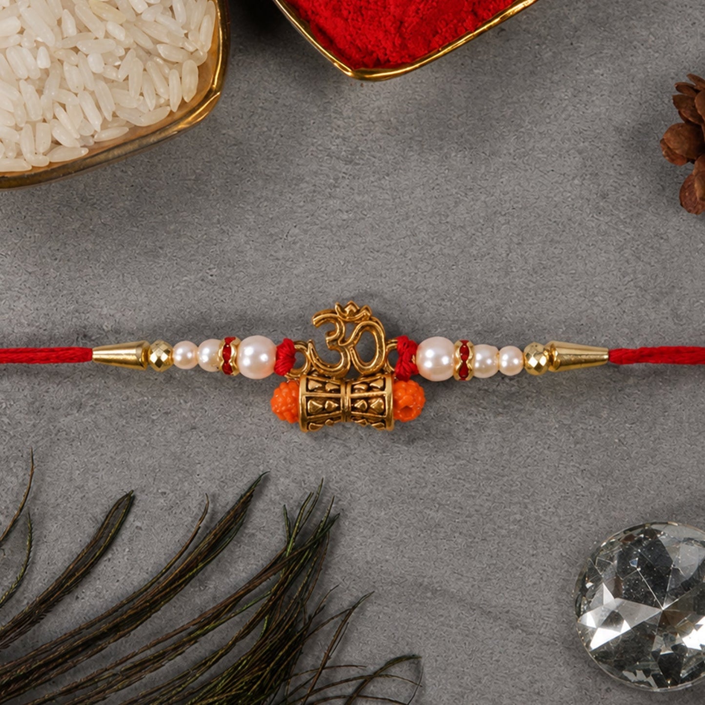 Collection of Rakhis with prominently featured Om Rudraksha Rakhi.
