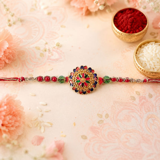 Vibrant multicolour Meenakari Rakhi with floral design and crystal beads, perfect for Raksha Bandhan.