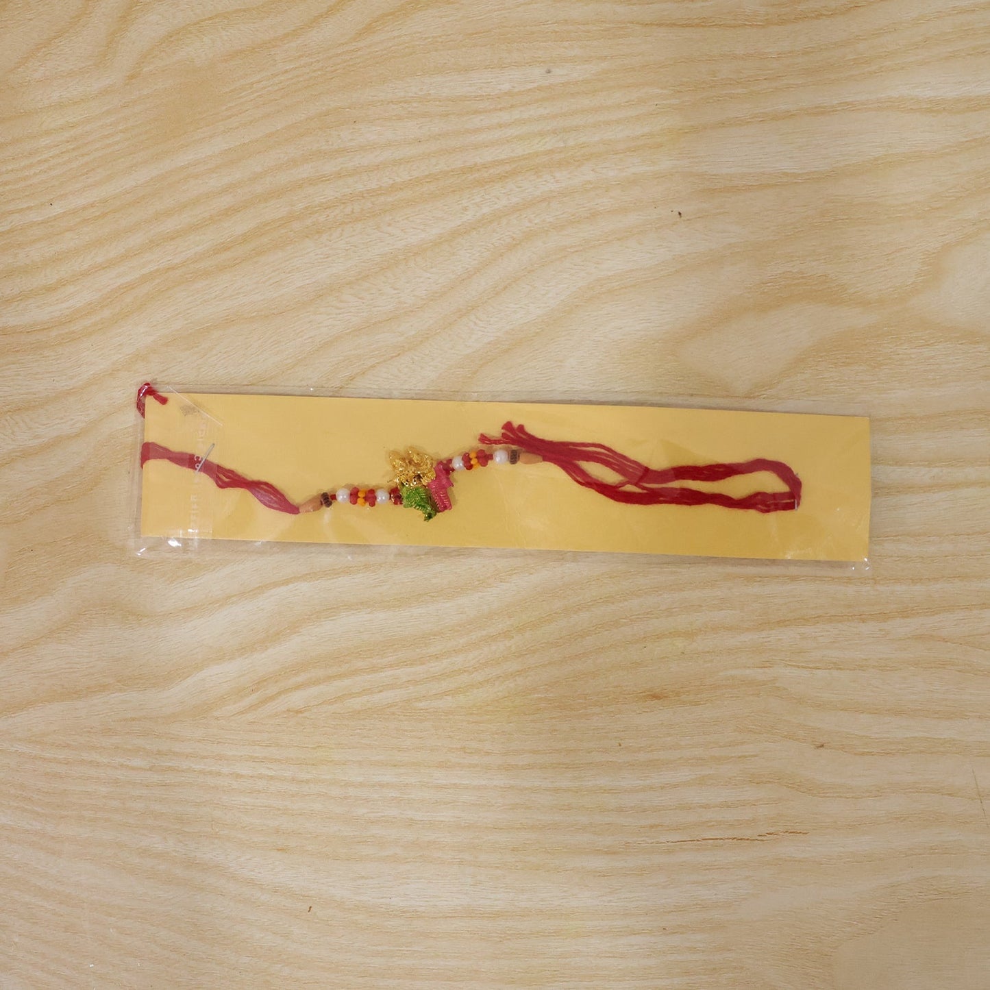 Close-up of stylish decorative rakhi with colorful beads