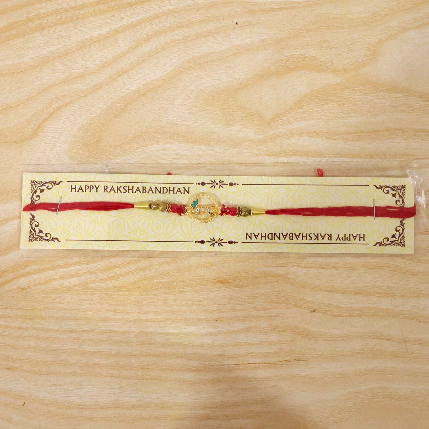Beautifully crafted rakhi with eye-catching centerpiece and traditional style