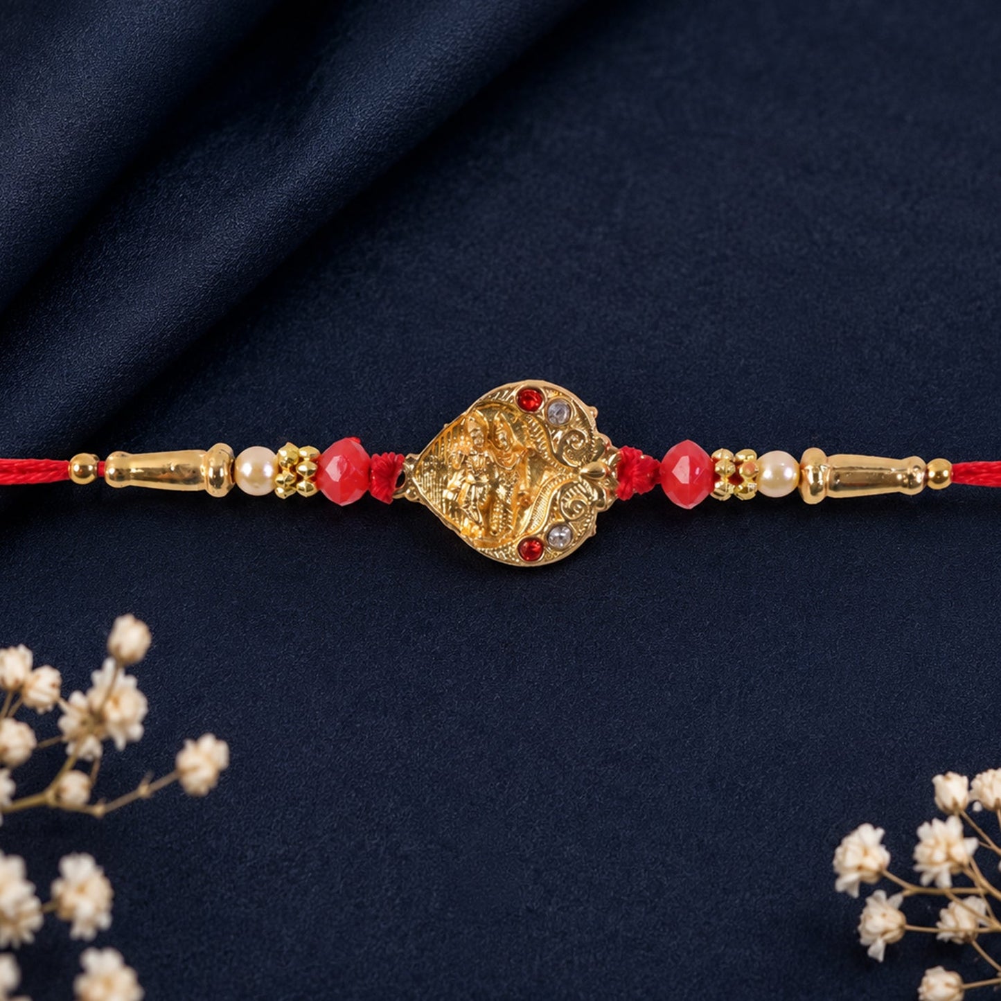 Close-up of a stylish traditional rakhi with intricate bead detailing.