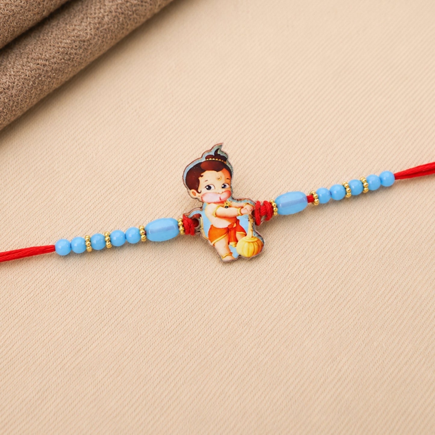 Stylish Bal Hanuman rakhi with beads and traditional thread