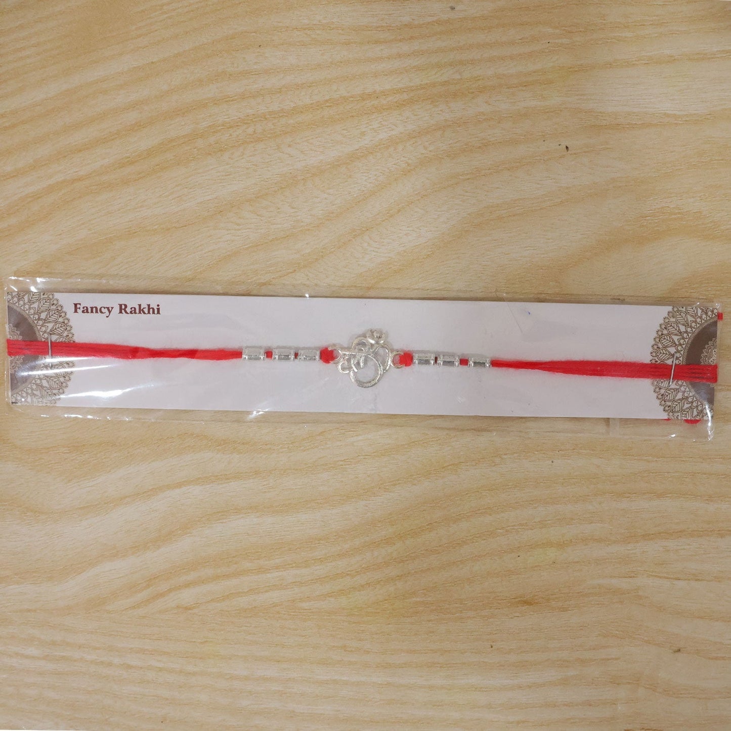 Festive Rakhi with attractive center design and decorative beads for rakhi festival.