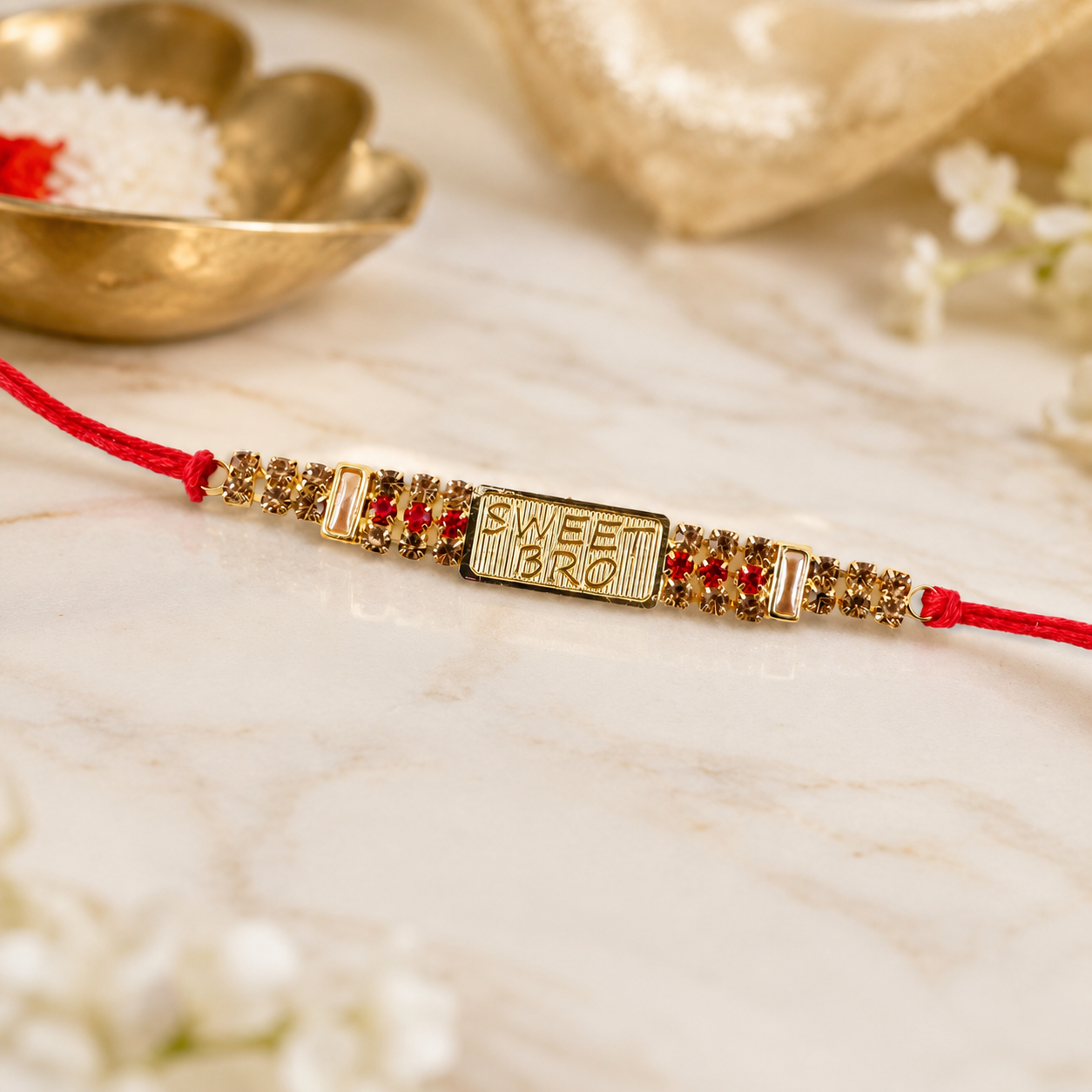 Side view of 'Sweet Bro' Rakhi showing thread and bead detail