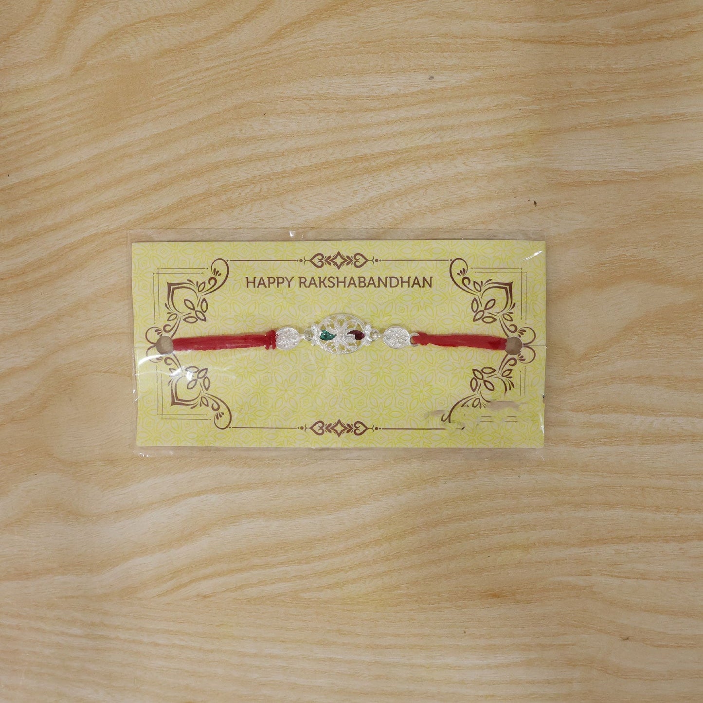 Traditional Silver Filigree Rakhi from different perspectives