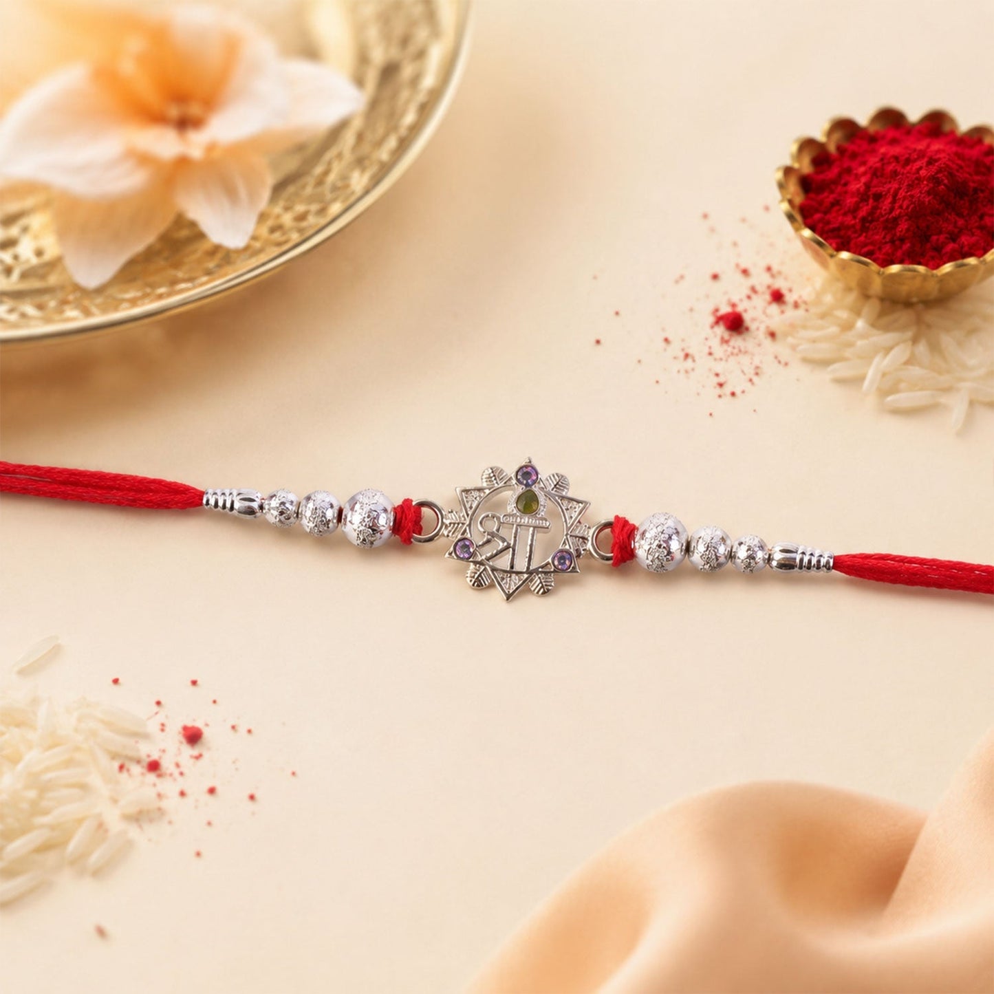 Elegant Silver Swastik Rakhi with beads and detailed finishing